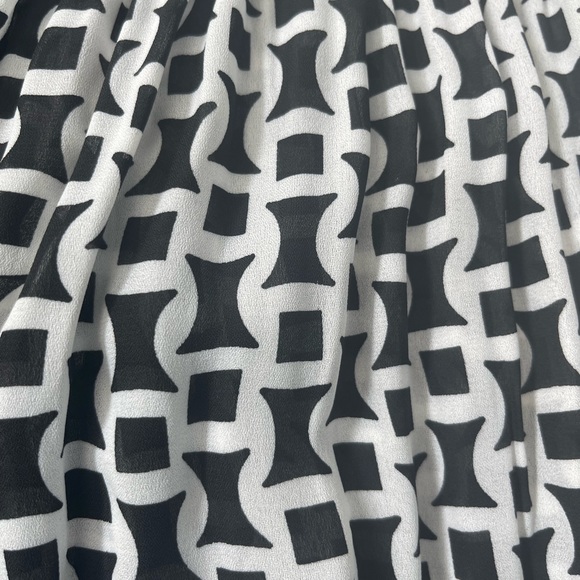 Floral & Ivy short sleeve black and white smocked top. - Picture 3 of 4